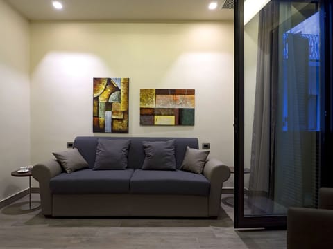 Family Suite | Living area | Smart TV