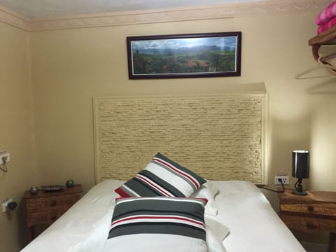 Triple Room, Balcony, Mountain View | Minibar, in-room safe, blackout drapes, bed sheets