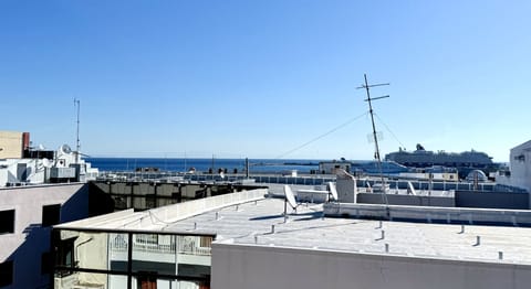 Superior Room, 3 Twin Beds, Harbor View | Terrace/patio