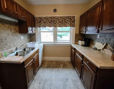 Kitchen with new floor and tile work