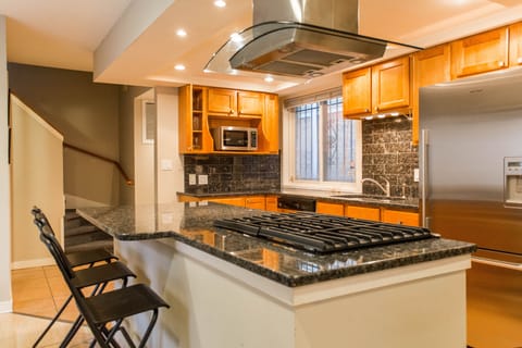 Convenient center island gives open feel to kitchen and provides gathering space