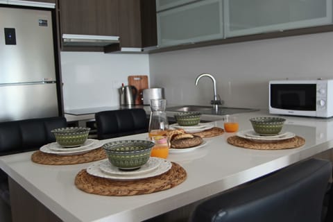 Apartment | Private kitchen | Coffee/tea maker, highchair, cookware/dishes/utensils