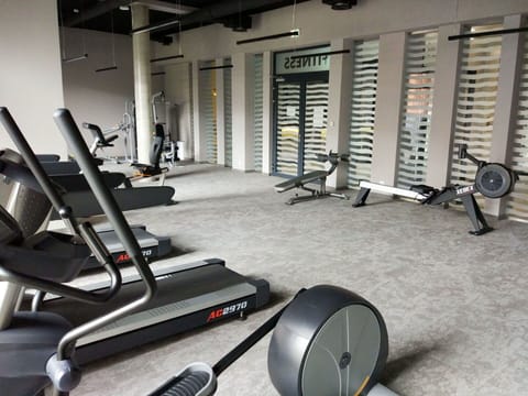 Exercise Machine, Automotive Tire, Exercise Equipment, Building, Gym, Flooring, Floor, Automotive Design, Stationary Bicycle