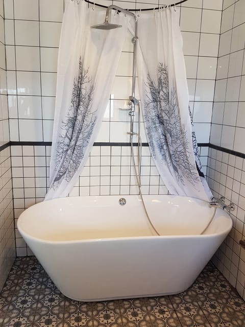 Superior Double Room, Private Bathroom (Fjósið) | Bathroom shower