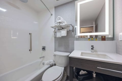 Room, 2 Queen Beds | Bathroom | Eco-friendly toiletries, hair dryer, towels