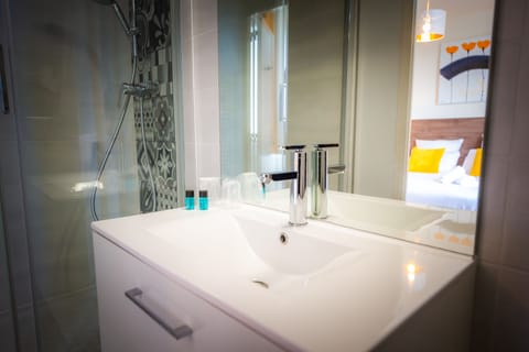 Eco-friendly toiletries, hair dryer, towels, soap