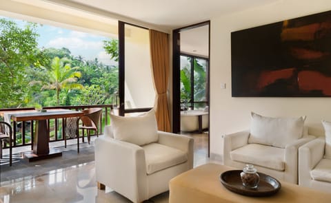 Family Suite, 1 Bedroom | Living room | 32-inch LCD TV with cable channels, TV