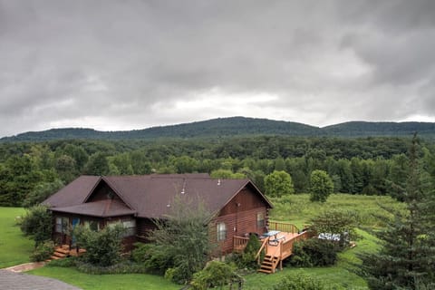 Our beautiful mountain view. The 3 acre landscaped yard is a perfect for kids. We provide horse shoes, croquet, and yard games.