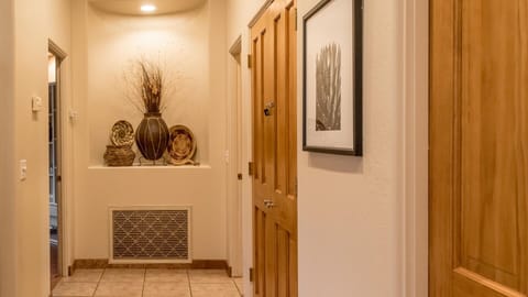 Hallway leading to the primary suite
