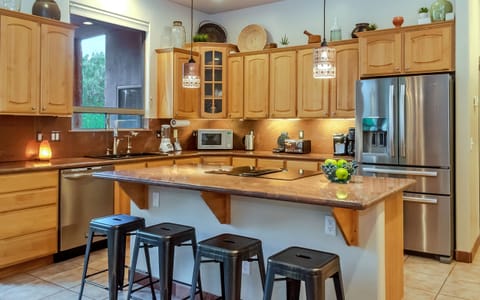 Granite countertops, stainless appliances and all your cooking essentials!