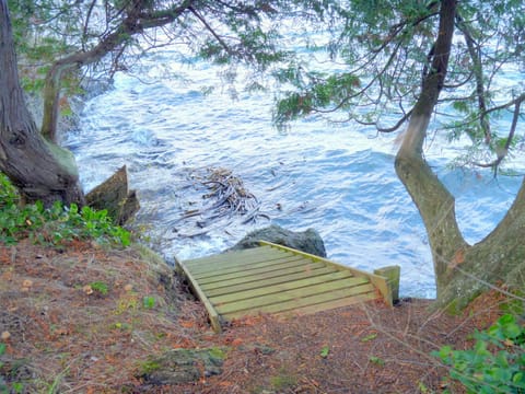 The tide is in, stairs to the north edge of property, great for launching kayaks