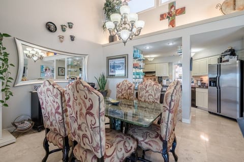 Dining table with seating for six.  Large granite top table. 