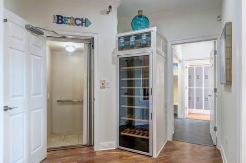 1st Floor Elevator entrance and large wine fridge!