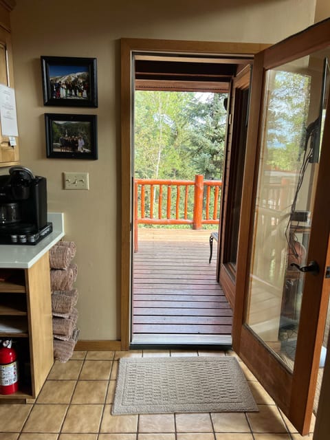 Wooded backyard provides tons of privacy, overlooks golf course & babbling brook