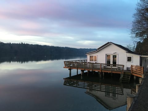 Our eco-cottage in high tide stillness over the Salish Sea.