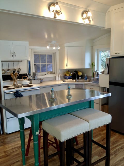 The kitchen area is well equipped, and now includes a small microwave.