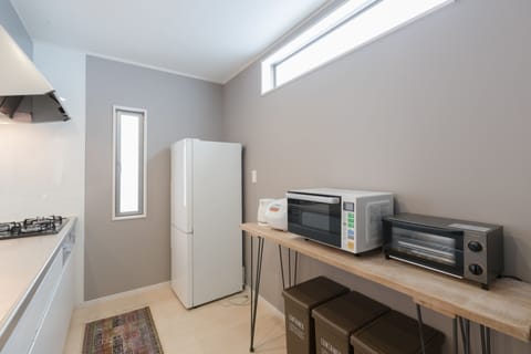 Holiday home | Private kitchen | Fridge, microwave, stovetop, electric kettle