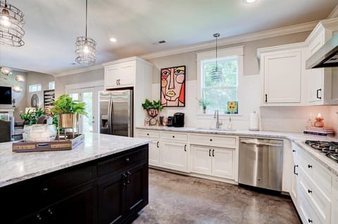 Stained concrete floors in the roomy kitchen.