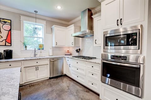 Spacious, well stocked kitchen makes cooking a joy.