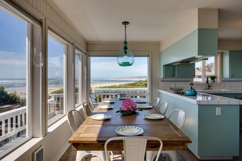 The kitchen opens on to the dining room for easy conversation.