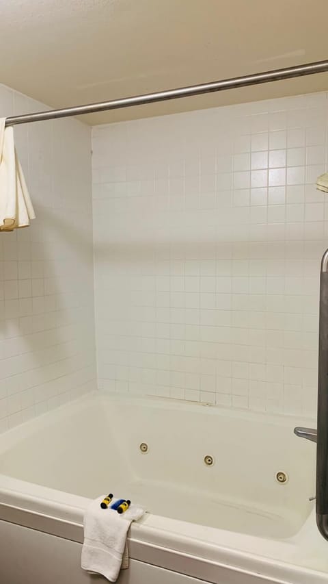 Premium Suite, Jetted Tub | Bathroom | Hair dryer, towels