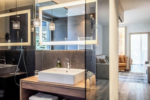 Superior Quadruple Room, Balcony, Pool View | Bathroom | Shower, bathrobes, slippers, bidet