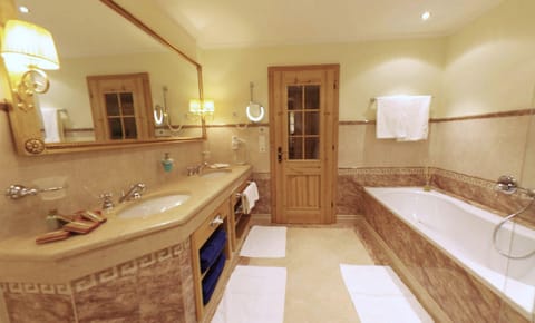Family Suite, Balcony, Golf View | Bathroom | Shower, bathrobes, slippers, bidet