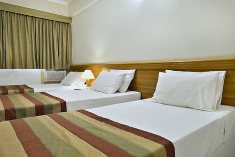 Executive Triple Room | Minibar, desk, free WiFi, bed sheets