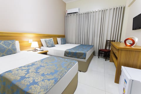 Family Triple Room (2 Beds) | Minibar, desk, free WiFi, bed sheets