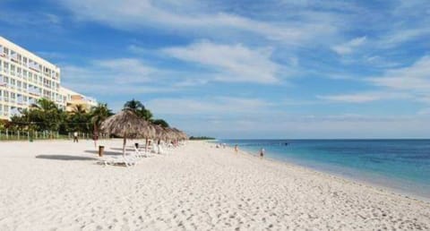 Beach nearby, white sand, beach shuttle, beach towels