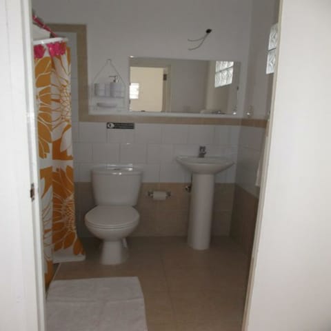 Quadruple Room, Multiple Beds, Non Smoking | Bathroom | Shower, free toiletries, hair dryer, towels