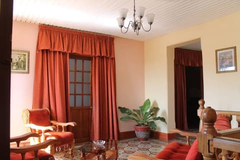 Triple Room, Multiple Beds, Non Smoking | Living area | Flat-screen TV