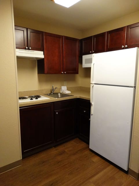 Suite, 1 King Bed with Sofa bed, Non Smoking | Private kitchen | Fridge, microwave, stovetop, coffee/tea maker