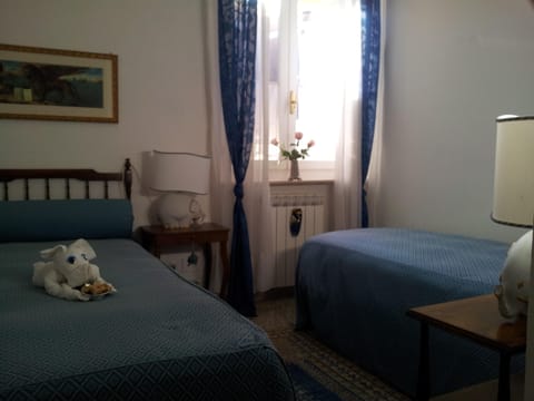 Standard Twin Room, Shared Bathroom | Blackout drapes, iron/ironing board, free WiFi, bed sheets