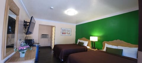 Room, 2 Queen Beds, Non Smoking, Private Bathroom | Free WiFi, bed sheets