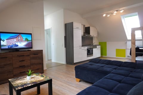 Superior Apartment (13-14) | Living area | 40-inch flat-screen TV with satellite channels, Smart TV, Netflix