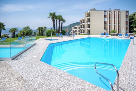 2 outdoor pools, open 8:30 AM to 8:30 PM, sun loungers