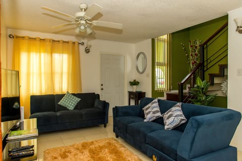 Family Villa, 2 Bedrooms | Living room | 50-inch flat-screen TV with cable channels, TV, DVD player