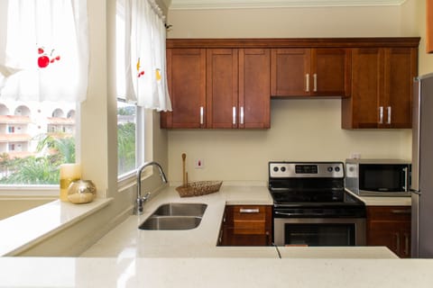 City Apartment, 2 Bedrooms | Private kitchen | Full-size fridge, microwave, oven, stovetop