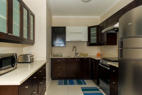 Luxury Apartment, 2 Bedrooms | Private kitchen | Full-size fridge, microwave, oven, stovetop