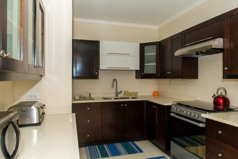 Luxury Apartment, 2 Bedrooms | Private kitchen | Full-size fridge, microwave, oven, stovetop