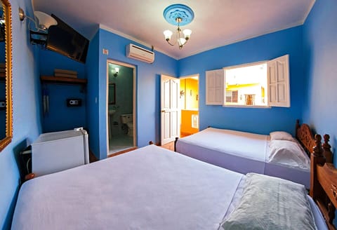Comfort Quadruple Room, 2 Double Beds, Non Smoking | Minibar, in-room safe, individually decorated, individually furnished