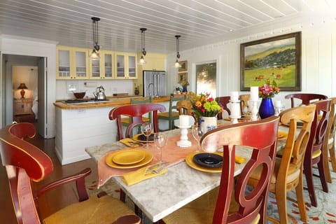 The dining table seats 10 comfortably with a wide variety of dinner wear and serving pieces available.