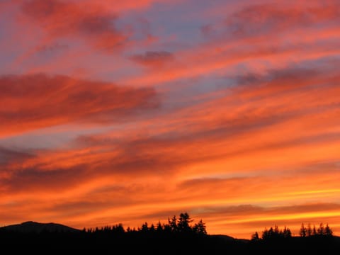 Our deck overlooks the fields and captures the beautiful sunsets to the west