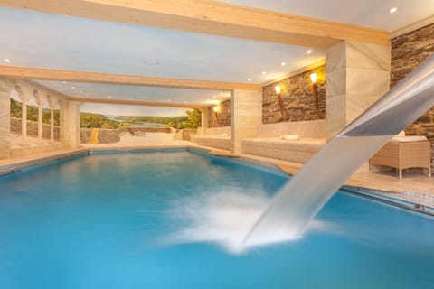 Indoor pool, open 7:00 AM to 10:00 PM, sun loungers