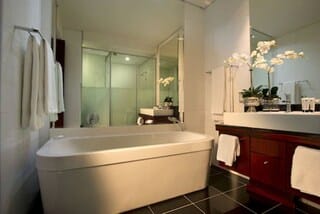 Executive Room, 1 King Bed | Bathroom | Separate tub and shower, deep soaking tub, rainfall showerhead