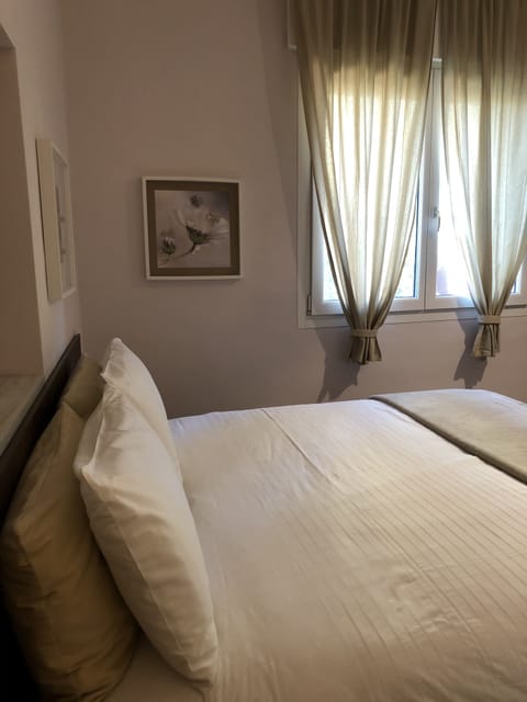 Family Condo | Minibar, iron/ironing board, free WiFi, bed sheets