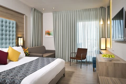 Superior Room | Minibar, in-room safe, blackout drapes, bed sheets