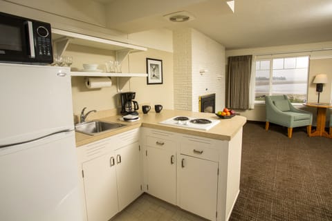 One Bedroom Suite, Some with Fireplace | Private kitchenette | Fridge, microwave, dishwasher, coffee/tea maker