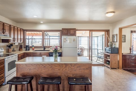 Kitchen island provides extra cooking and seating space